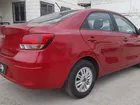 KIA SOLUTO 2024 - Transmisión Manual - Color ROJO BURDEO