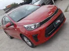 KIA SOLUTO 2024 - Transmisión Manual - Color ROJO BURDEO