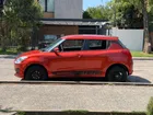 SUZUKI SWIFT 1.2 2023     - Transmisión Manual     - Color Naranjo