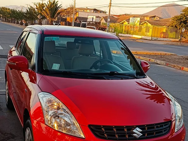 SUZUKI SWIFT DZIRE 2014     - Transmisión Manual     - Color Rojo