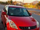 SUZUKI SWIFT DZIRE 2014     - Transmisión Manual     - Color Rojo