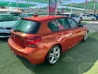 BMW 118 I 2016     - Transmisión Automático     - Color NARANJO